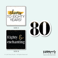 Load image into Gallery viewer, Three 80th birthday photobooth prop signs with 'Cheers to Eighty Years!' and 'Eighty & Enchanting' text, along with a number '80'