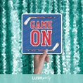 Load image into Gallery viewer, Hand holding a hockey photo booth prop sign with 'Game On' by Lush Party Studio