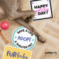 Load image into Gallery viewer, Dog lying on a wooden floor with adoption-themed signs and a 'Happy gotcha day!' prop by lush party studio.