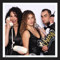 Load image into Gallery viewer, Three people posing with cheers prop in a photo booth