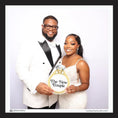 Load image into Gallery viewer, Man and woman in formal attire holding a sign with 'The New Couple' and a large diamond ring prop.
