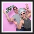 Load image into Gallery viewer, Two people posing with a wedding mr and mrs photo booth prop sign by lush party studio
