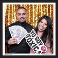 Load image into Gallery viewer, Two people posing with toxica photo booth prop sign by lush party studio