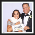 Load image into Gallery viewer, man and woman holding photobooth prop signs for bridal party with text 'Bride's parents' text.