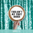 Load image into Gallery viewer, Prop sign with 'This ain't my first rodeo' text by Lush Party Studio.