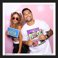 Load image into Gallery viewer, Two people posing with 90s themed prop signs by Lush Party Studio
