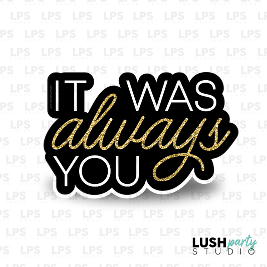 Text 'It was always you' in black and gold on a white background photo booth prop sign