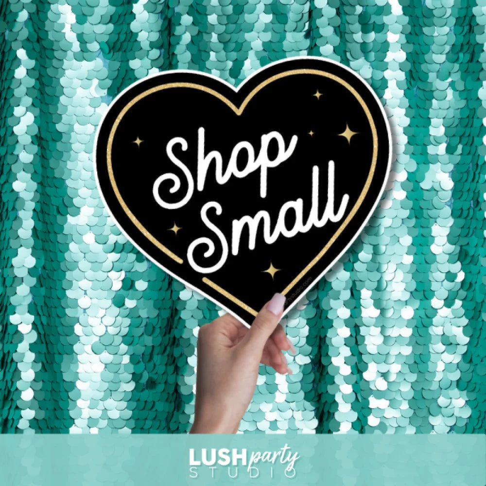 Heart-shaped photo booth prop sign with 'Shop Small' text by Lush Party Studio 