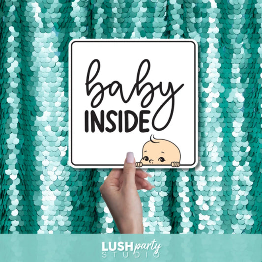 gender reveal photo booth prop sign with baby inside text by lush party studio