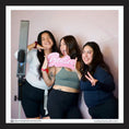 Load image into Gallery viewer, Three women posing with a 'Besties' photo booth prop sign by Lush Party Studio
