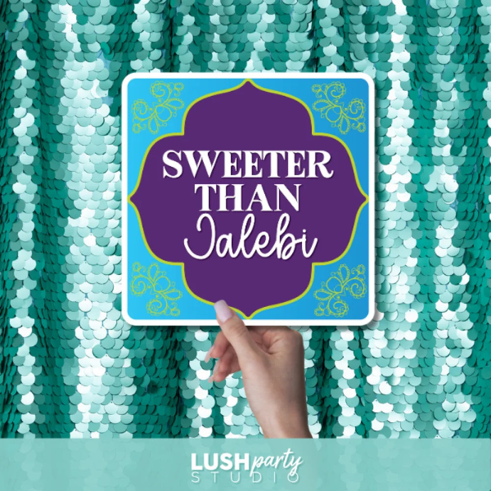 Bollywood photo prop sign with 'Sweeter Than Jalebi' text by lush party studio