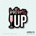 Load image into Gallery viewer, Photo booth prop with 'bottoms up' text and a champagne glass by Lush Party Studio.
