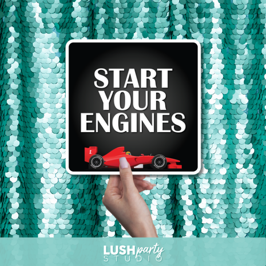 car racing photo booth prop sign with 'Start Your Engines' text by lush party studio