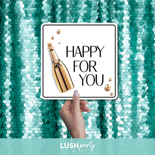 general celebration photo booth prop with 'Happy for You' text by lush party studio