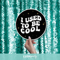 Load image into Gallery viewer, class reunion photo prop sign with 'I Used to Be Cool' text against a teal sequin background, Lush Party Studio branding visible.
