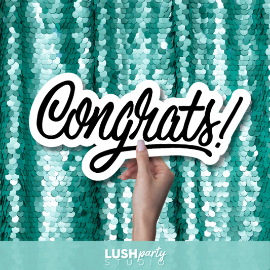 photo booth prop sign with 'Congrats!' text by lush party studio