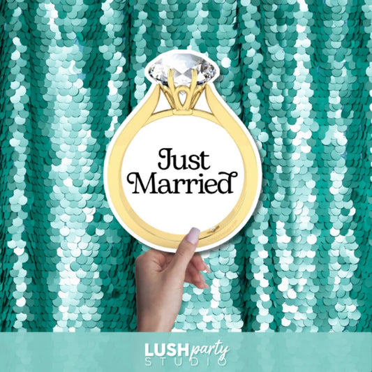photo booth prop Gold ring with 'Just Married' text by lush party studio