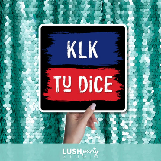 dominican theme photo booth prop sign with 'KLK TU DICE' text by lush party studio