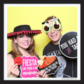 Load image into Gallery viewer, Two people in a photo booth with fiesta props for cinco de mayo 
