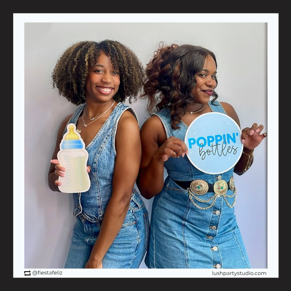 photobooth prop sign that says 'Poppin Bottles'.