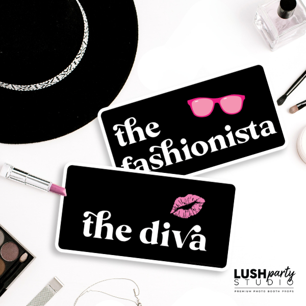 Two black makeup palettes with 'the fashionista' and 'the diva' text, surrounded by makeup items on a white surface.