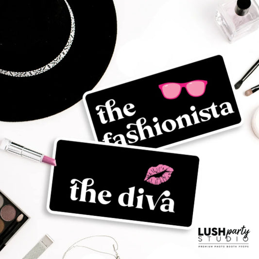 Two black makeup palettes with 'the fashionista' and 'the diva' text, surrounded by makeup items on a white surface.