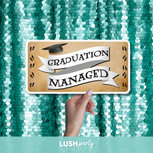 Graduation-themed sign with 'Graduation Managed' text by Lush Party Studio .