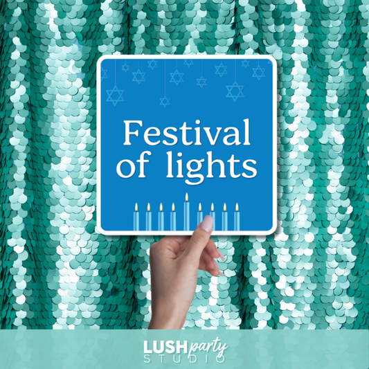 photo booth prop sign with 'Festival of lights' text by lush party studio