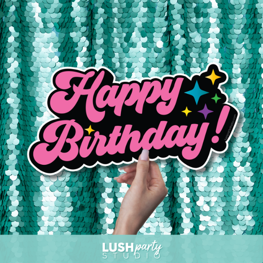 happy birthday prop sign in pink by lush party studio
