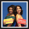 Load image into Gallery viewer, Two women holding photo booth prop signs with Spanish party text
