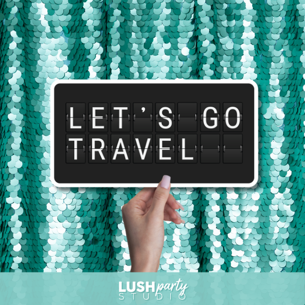 Photo Prop sign with 'LET'S GO TRAVEL' by Lush Party Studio branding.