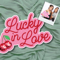 Load image into Gallery viewer, photo booth prop with 'Lucky in Love' text by Lush Party Studio 
