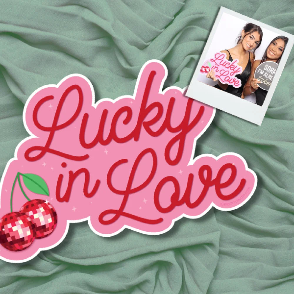 photo booth prop with 'Lucky in Love' text by Lush Party Studio 