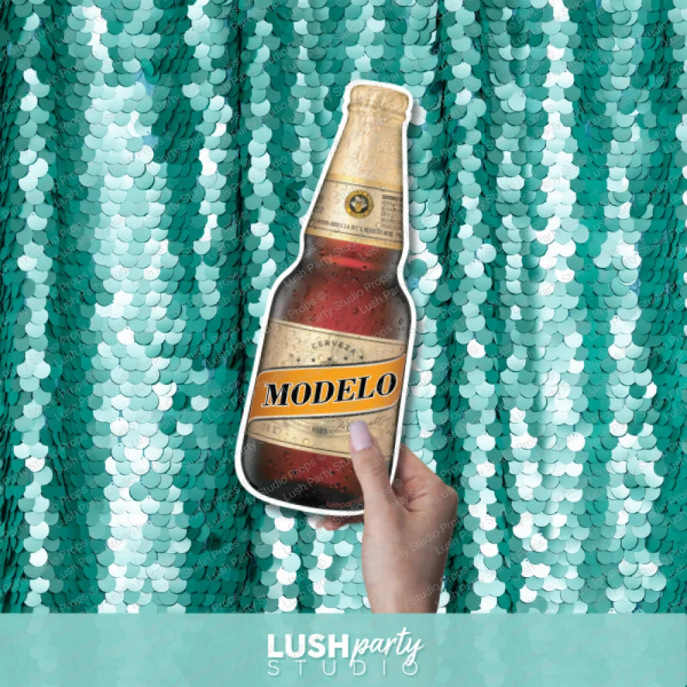 photo prop of bottle-shaped Modelo beer by Lush Party Studio