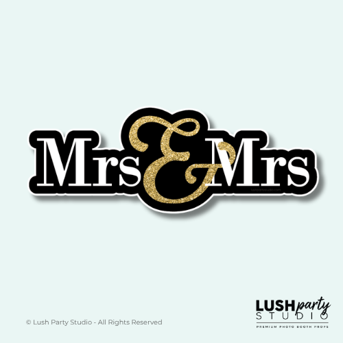 Photobooth prop with 'Mrs & Mrs' text with gold by Lush Party Studio .