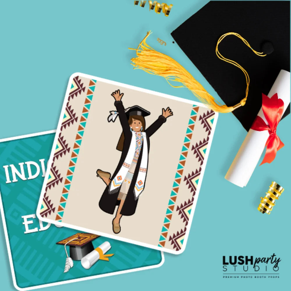 Native Graduation photo booth props with a card, cap, and diploma on a blue background.
