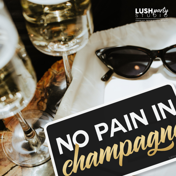 No pain in champagne prop sign by lush party studio