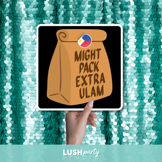 photo prop with text 'Might Pack Extra Ulam' by Lush Party Studio 