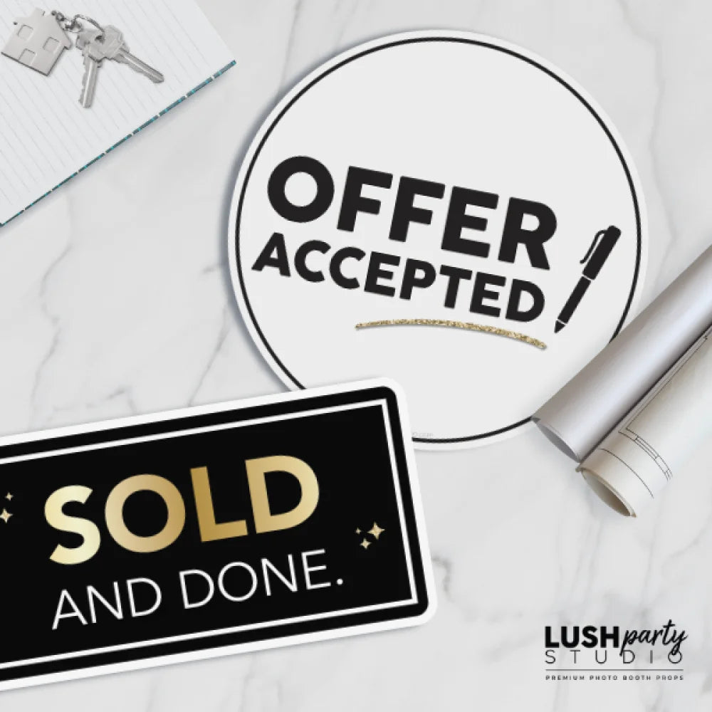 Prop signs on a marble surface with 'Offer Accepted' and 'Sold and Done.' text byLush Party Studio logo.