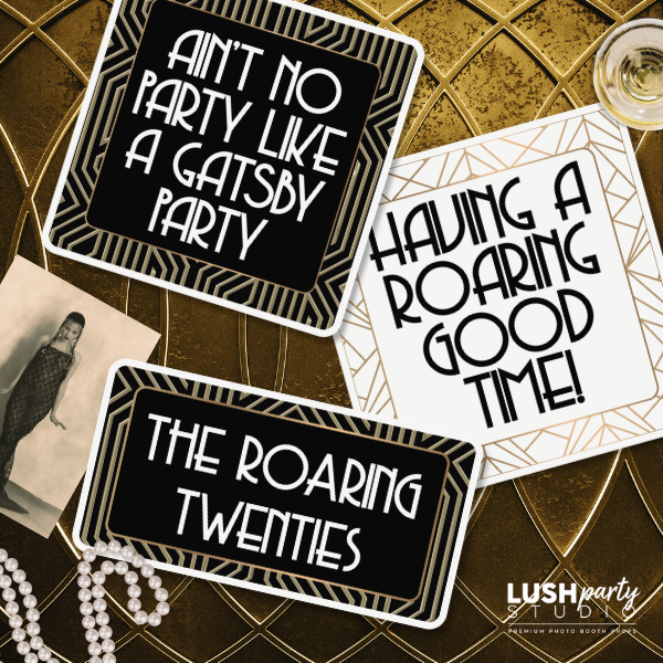 Prop signs with Gatsby-themed text on art deco background by Lush Party Studio