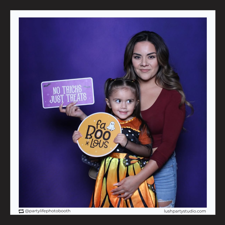 Halloween photo booth prop signs against by lush party studio