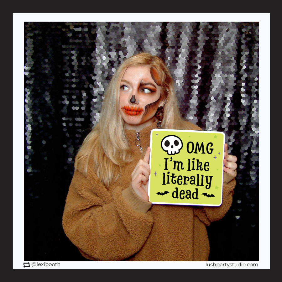 Halloween photo booth prop signs against by lush party studio