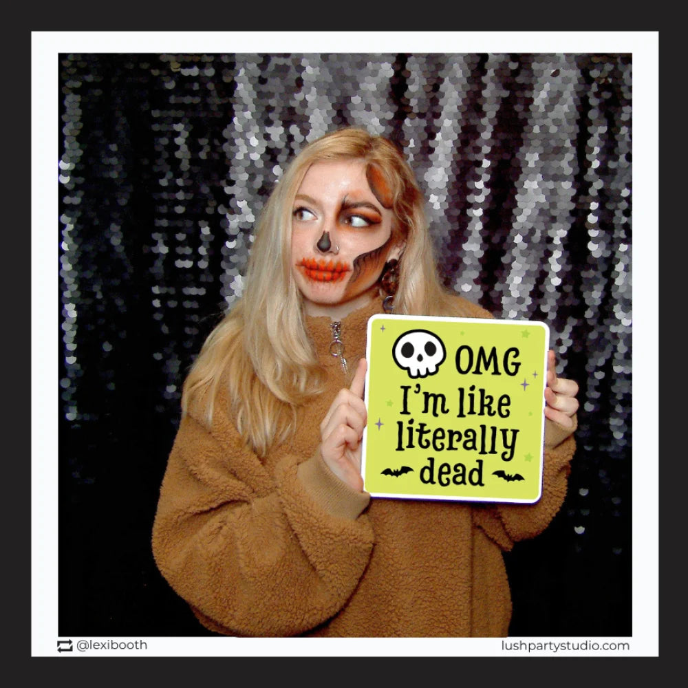 Halloween photo booth prop signs against by lush party studio