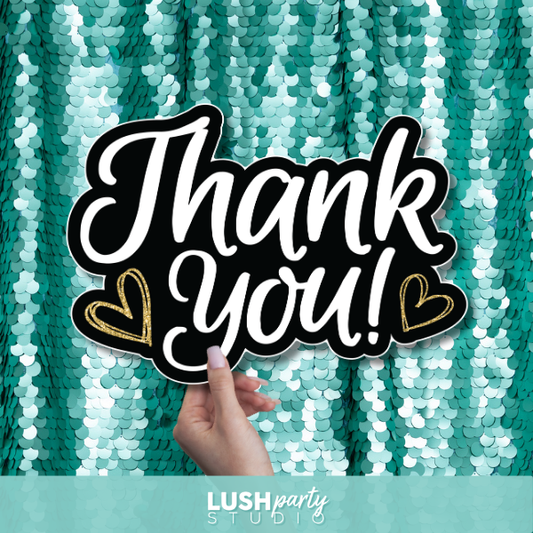 'Thank You!' prop sign with hearts by Lush Party Studio branding.