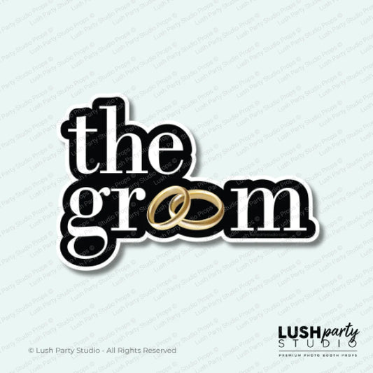photobooth prop with 'the groom' text and a gold ring by Lush Party Studio.