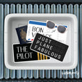 Load image into Gallery viewer, Tray with travel photo booth props by 'LUSH party studio'
