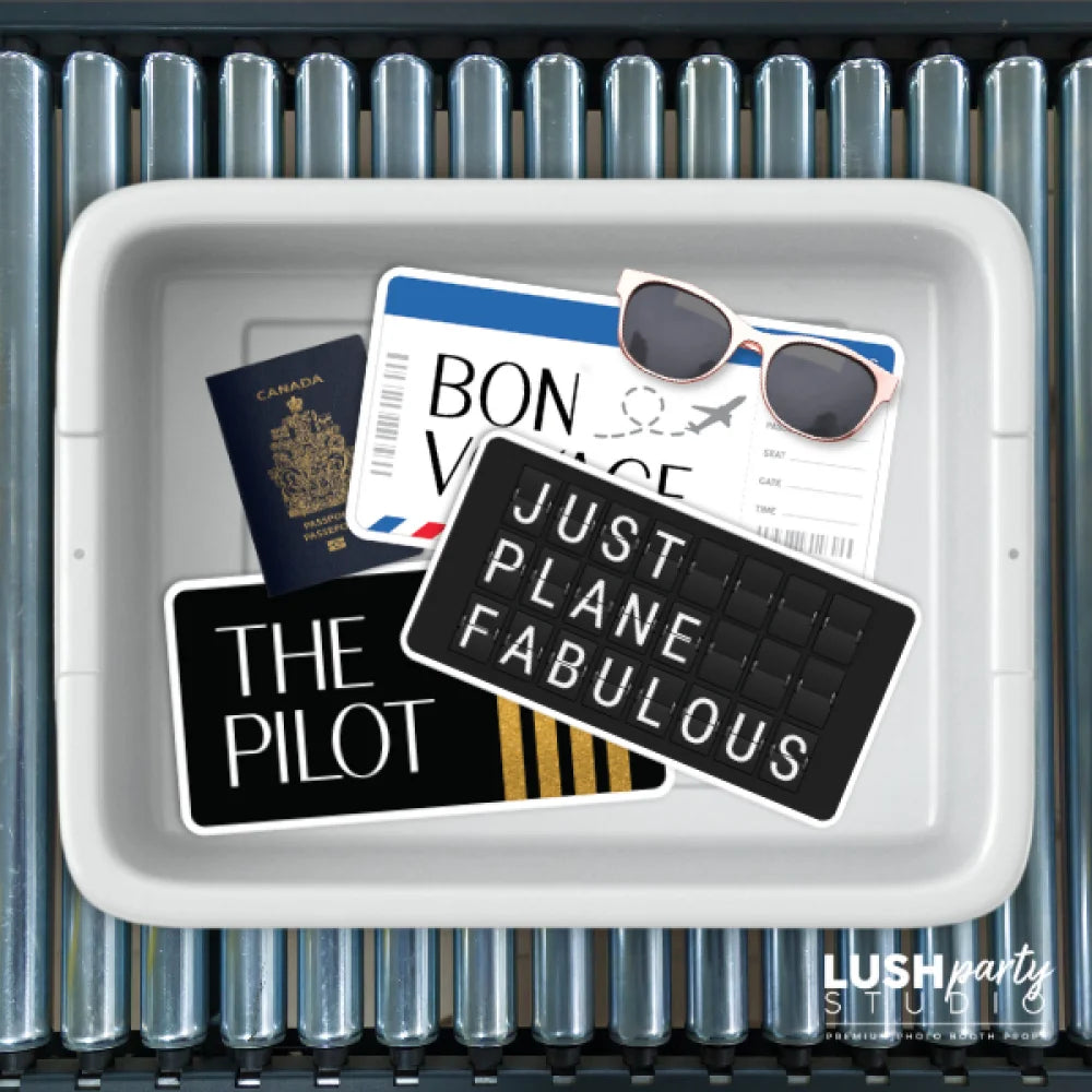 Tray with travel photo booth props by 'LUSH party studio'