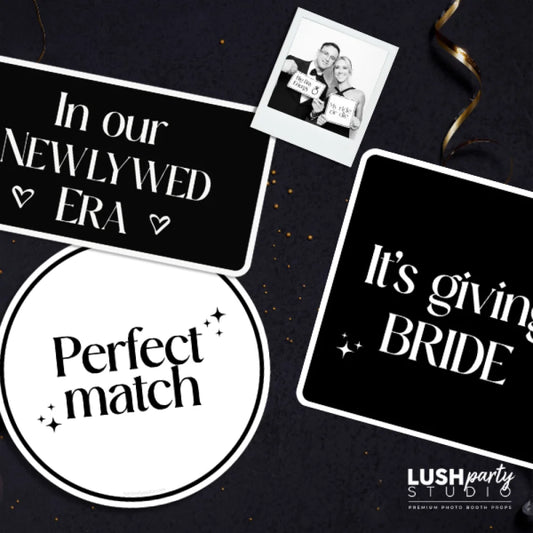 photobooth prop signs with wedding text and a photo by 'Lush Party Studio'.