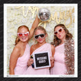 Load image into Gallery viewer, Three women in pink dresses with decorative sunglasses and a 'Wedding Babes' sign in a photo booth setting.
