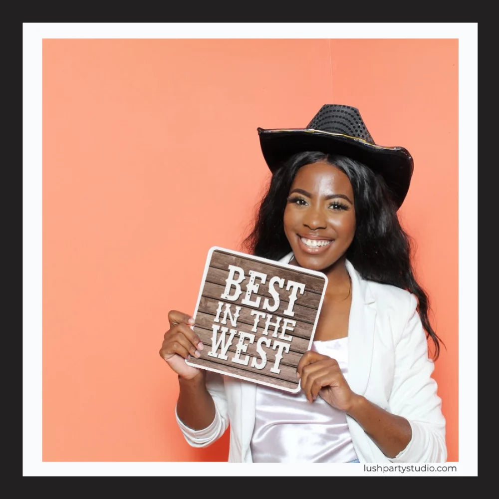 western photo booth prop sign that says 'Best in the West' for western theme parties
